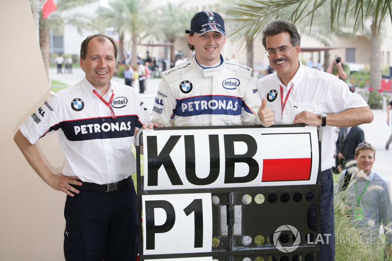 Willy Rampf, Technical Director, BMW Sauber, Robert Kubica, BMW Sauber, and Mario Theissen, Director, BMW Motorsport, celebrate their first pole position