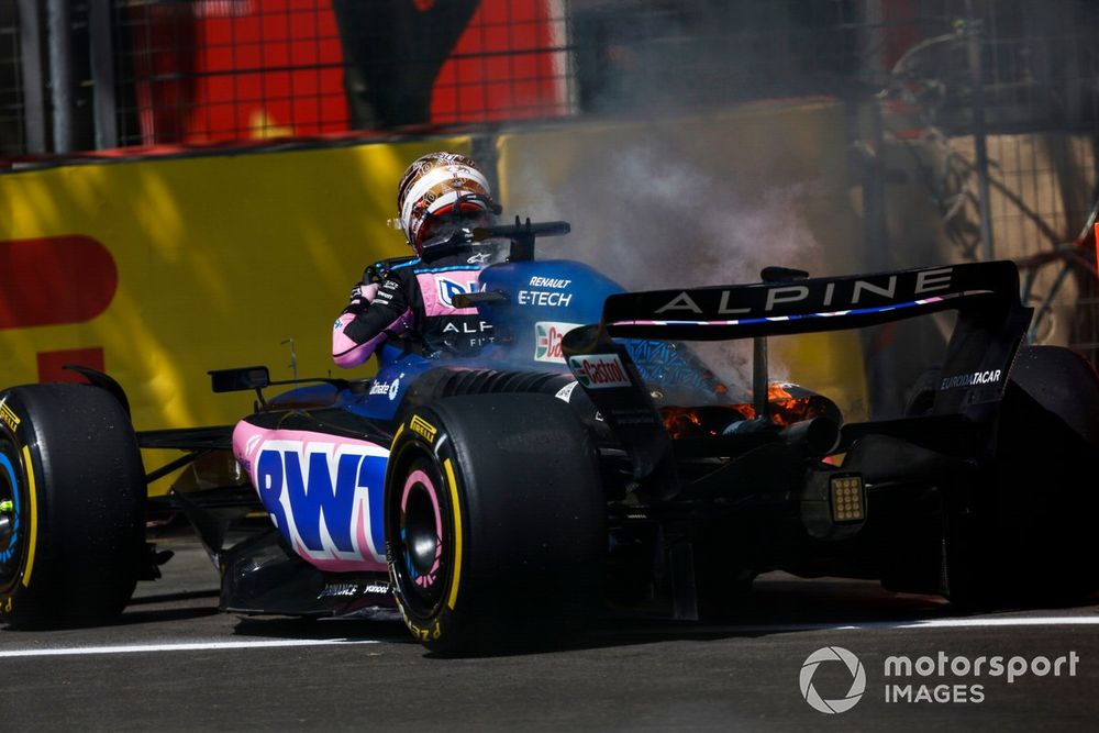 Pierre Gasly, Alpine A523, parks up and climbs out of his car due to a fire onboard