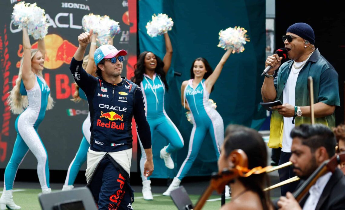 LL Cool J introduces Sergio Perez, driver of the No. 11 Red Bull RB19, ahead of the 2023 Miami Grand Prix at the Miami International Autodrome
