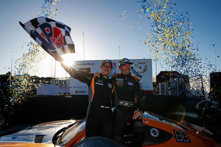 Kenny Murillo and Christian Szymczak celebrate their victory in the WeatherTech Raceway Laguna Seca 120, 5/13/2023 (Photo: Courtesy of IMSA)