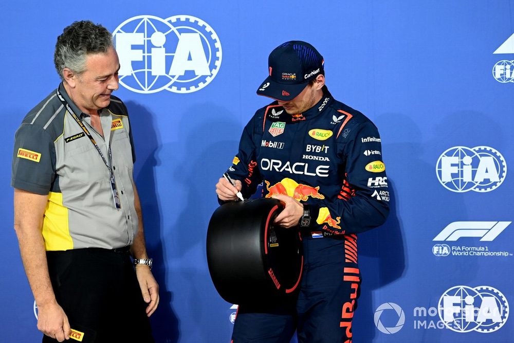 Max Verstappen, Red Bull Racing, receives his Pirelli Pole Position Award from Mario Isola, Racing Manager, Pirelli Motorsport