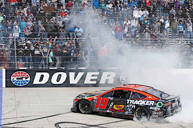 NASCAR Cup Series driver Martin Truex Jr. does a burnout after winning the Wurth 400 at Dover Motor Speedway, NKP