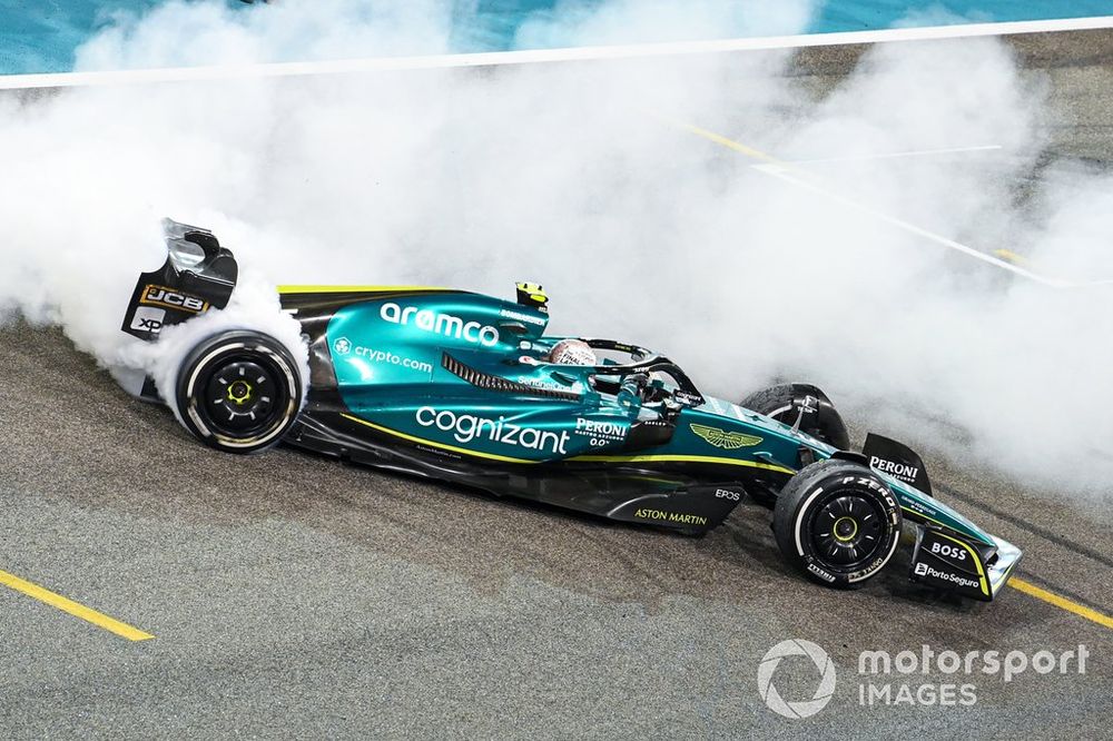 Sebastian Vettel, Aston Martin AMR22, performs donuts in celebration at the end of his final race in F1