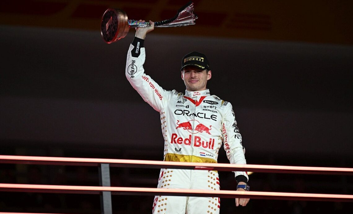 Verstappen overcomes penalty, damage to take 18th win of 2023