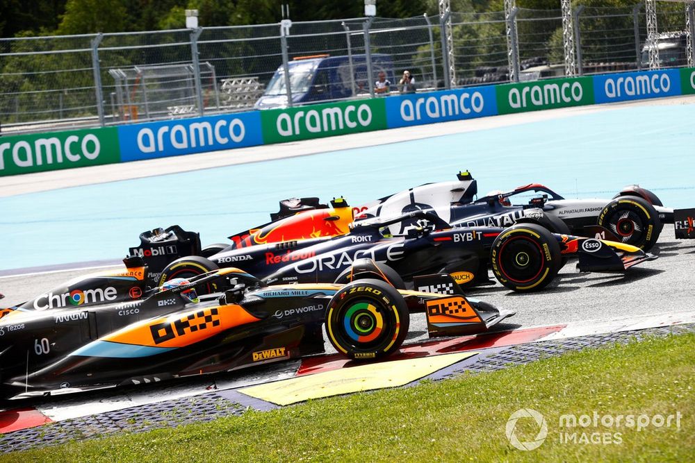 Yuki Tsunoda, AlphaTauri AT04, battles with Sergio Perez, Red Bull Racing RB19, Oscar Piastri, McLaren MCL60