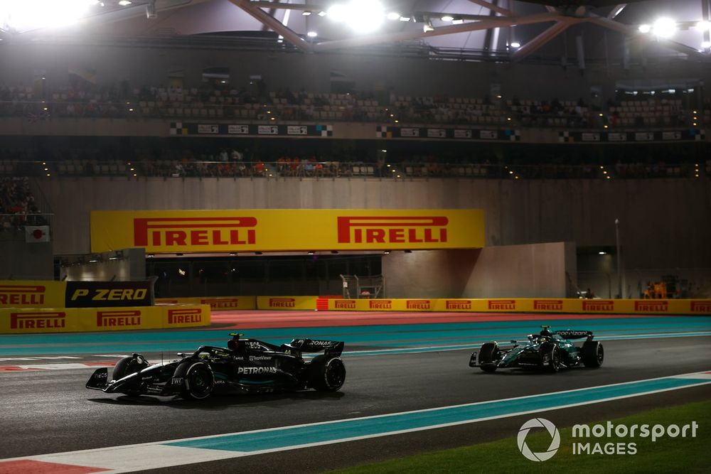 Sir Lewis Hamilton, Mercedes F1 W14, leads Fernando Alonso, Aston Martin AMR23