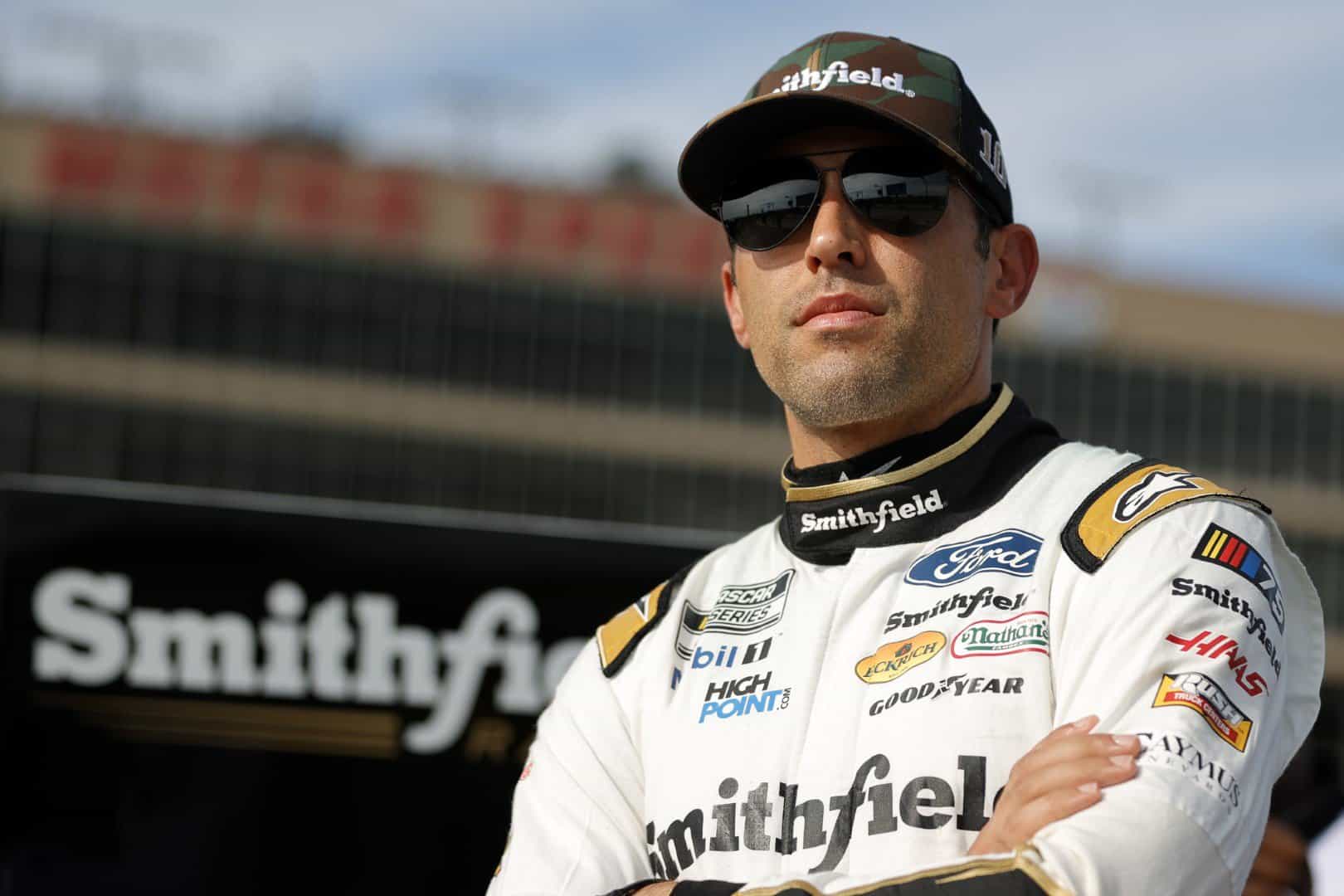 Aric Almirola, driver of the #10 Smithfield/IHOP Ford, looks on during qualifying for the NASCAR Cup Series Quaker State 400 Available at Walmart at Atlanta Motor Speedway on July 08, 2023 in Hampton, Georgia. (Photo by Alex Slitz/Getty Images)