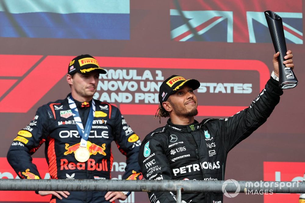 Max Verstappen, Red Bull Racing, 1st position, Lewis Hamilton, Mercedes-AMG, 2nd position, with his trophy