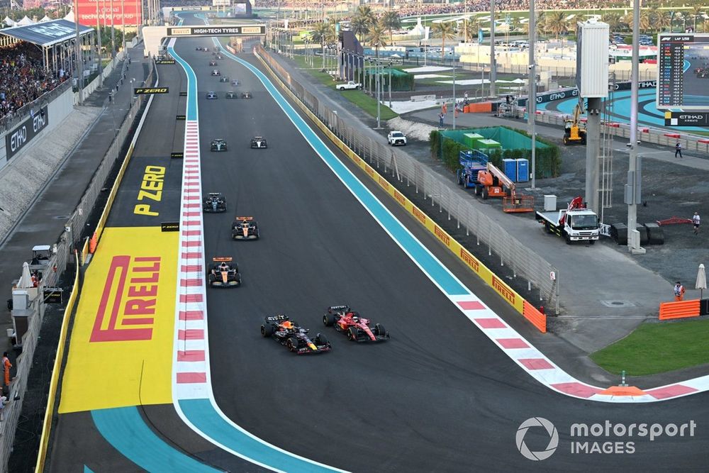Max Verstappen, Red Bull Racing RB19 battles with Charles Leclerc, Ferrari SF-23