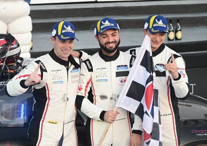 Riley Dickinson, Brady Golan and Michael McCarthy in victory lane after winning the BMW M Endurance Challenge at Daytona International Speedway, 1/26/2024 (Photo: Phil Allaway)