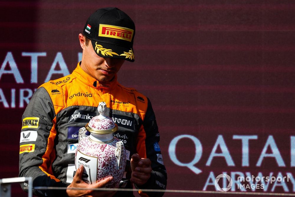 Lando Norris, McLaren, 2nd position, with his trophy