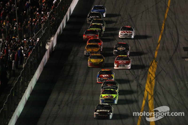 Mark Martin leads Kyle Busch with one lap to go