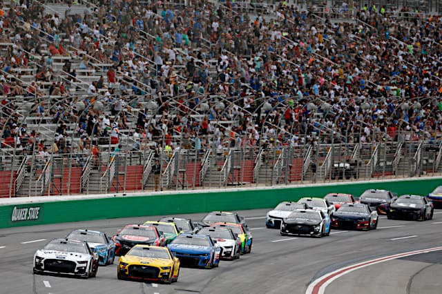 2023 Cup Atlanta II pack racing III - Team Penske teammates Ryan Blaney, No. 12 Ford, and Joey Logano, No. 22 Ford (Credit: NKP)