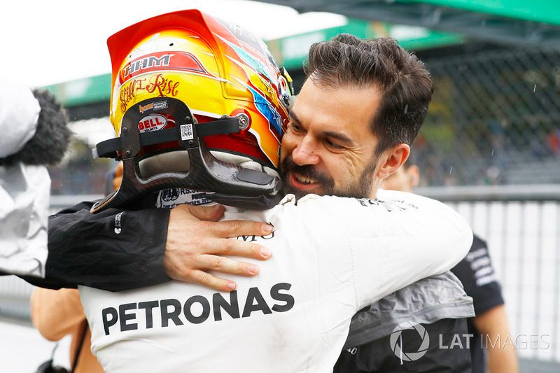 Lewis Hamilton, Mercedes AMG F1, celebrates, Marc Hynes after taking his 69th F1 Pole Position
