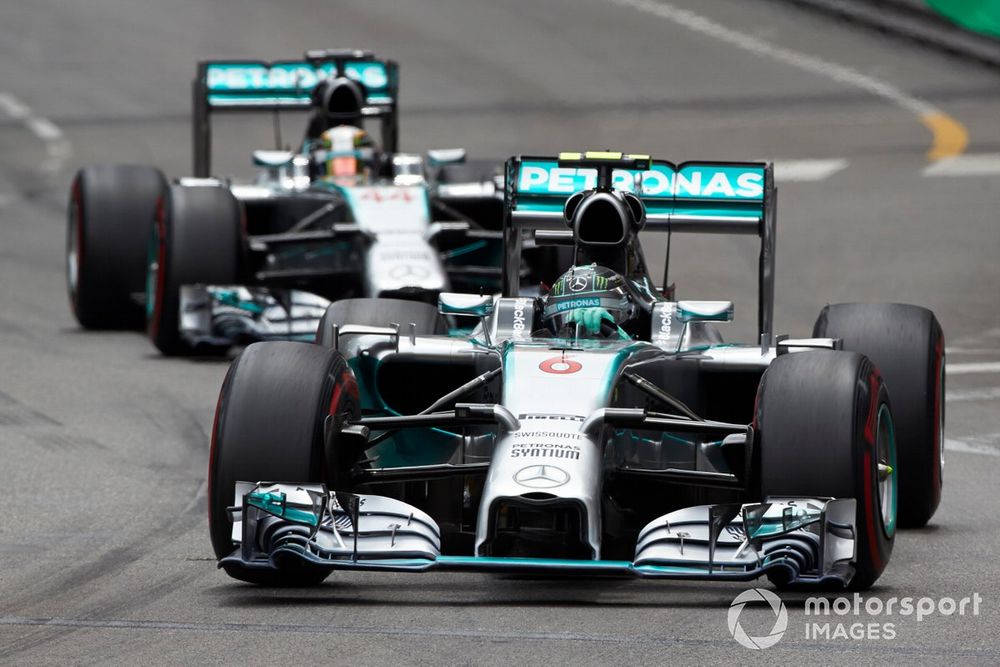 Nico Rosberg, Mercedes F1 W05 Hybrid, leads Lewis Hamilton, Mercedes F1 W05
