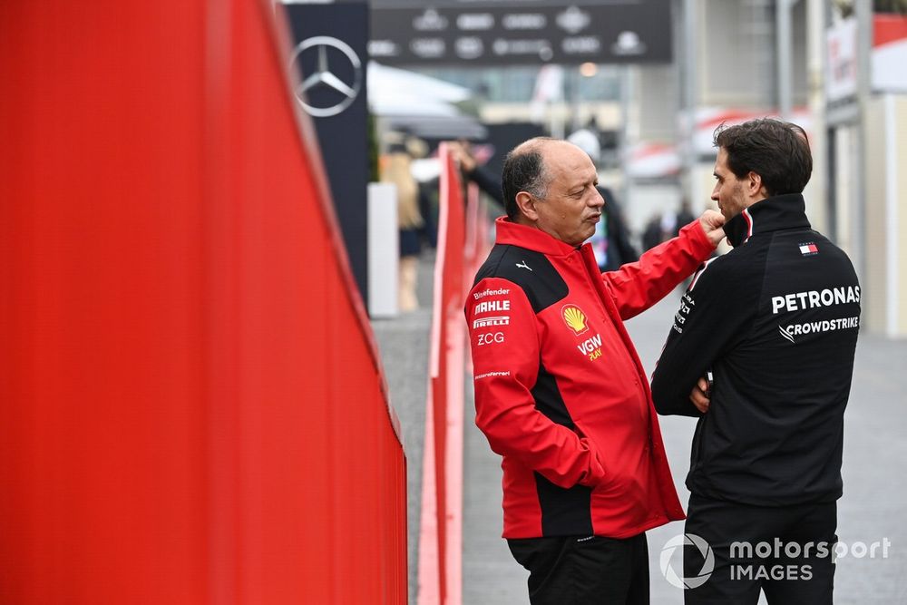 Frederic Vasseur, Team Principal and General Manager, Scuderia Ferrari, talks to Jerome d'Ambrosio, Driver Development Director, Mercedes-AMG