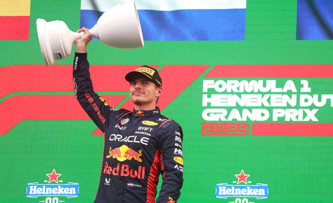 ZANDVOORT, NETHERLANDS - AUGUST 27: Race winner Max Verstappen of the Netherlands and Oracle Red Bull Racing celebrates on the podium during the F1 Grand Prix of The Netherlands at Circuit Zandvoort on August 27, 2023 in Zandvoort, Netherlands. (Photo by Peter Fox/Getty Images) // Getty Images / Red Bull Content Pool // SI202308270967 // Usage for editorial use only //
