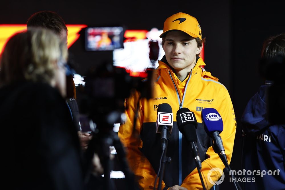 Oscar Piastri, McLaren, talks to the media