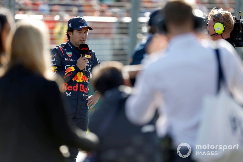 Sergio Perez, Red Bull Racing, gets interviewed in Parc Ferme after Qualifying