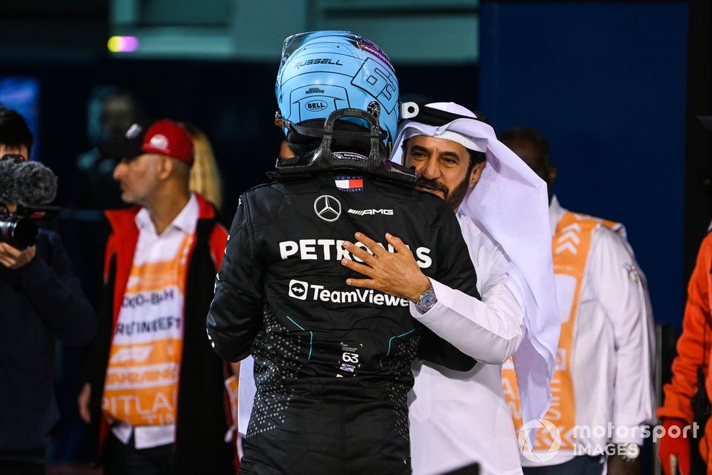 George Russell, Mercedes-AMG F1 Team, is congratulated by Mohammed bin Sulayem, President, FIA, in Parc Ferme