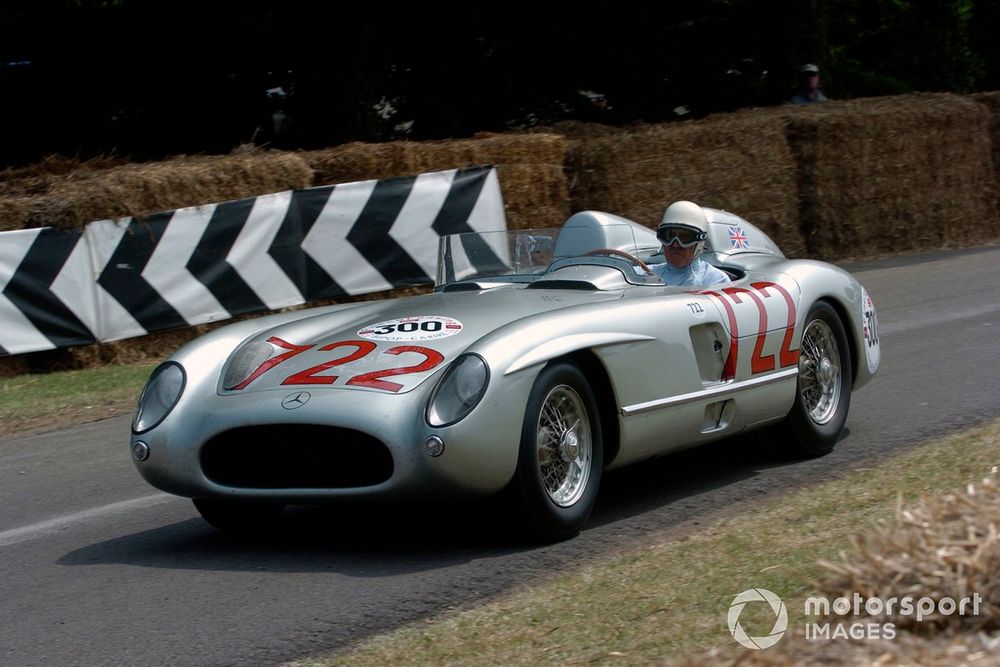 Stirling Moss in his famous 1955 Mille Miglia winning Mercedes Benz 300 SLR