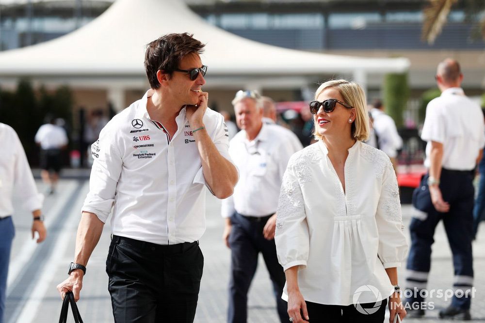 Toto Wolff, Team Principal and CEO, Mercedes AMG, arrives into the paddock with Susie Wolff
