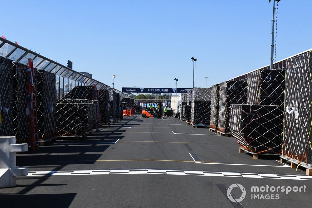 Boxes and crates of freight on the pit straight