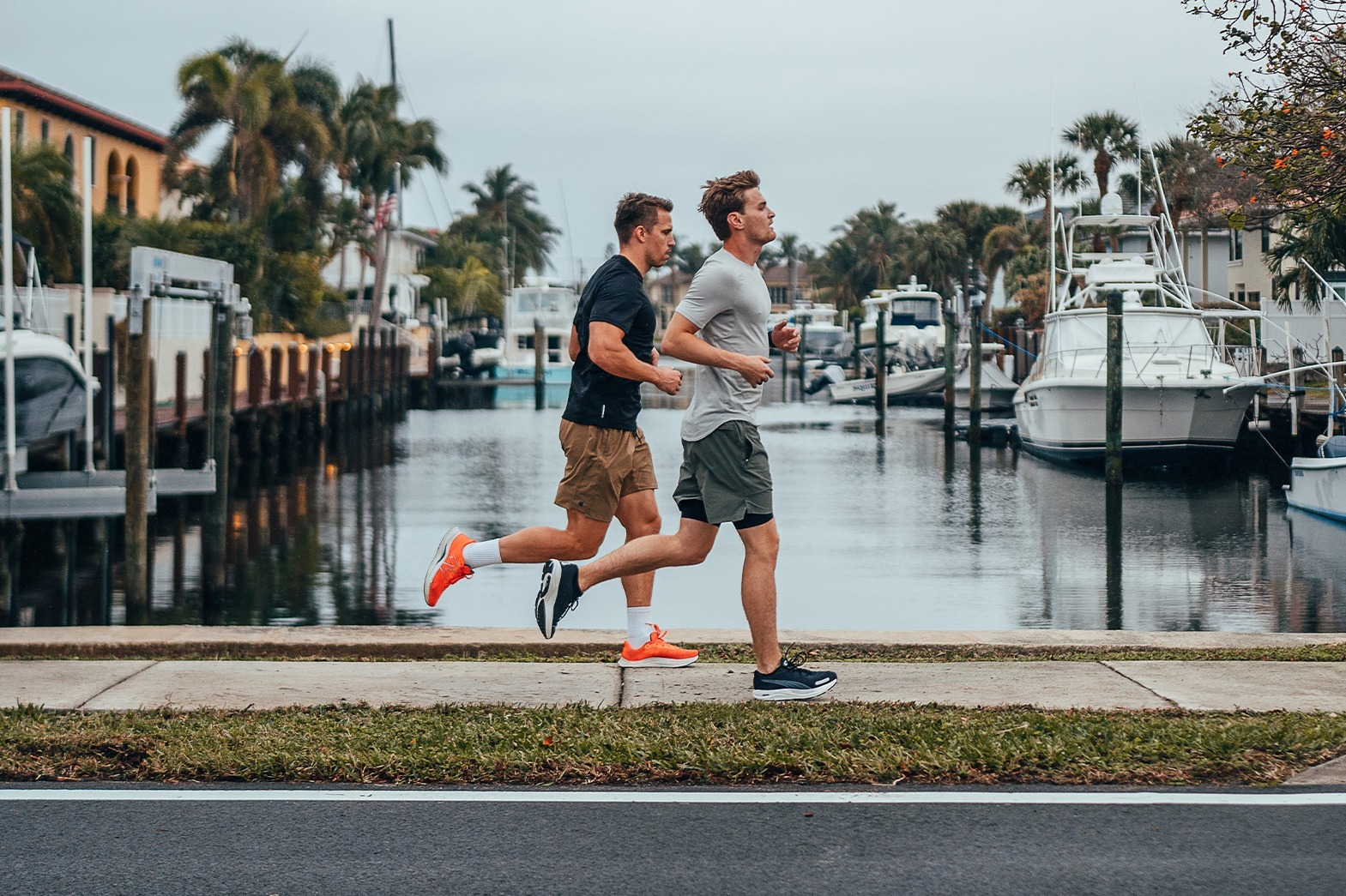Logan Sargeant (right) running with trainer Elias Huhtinen.