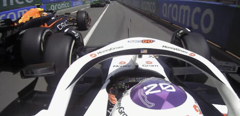 Magnussen began to draw alongside Perez as they accelerated up the hill