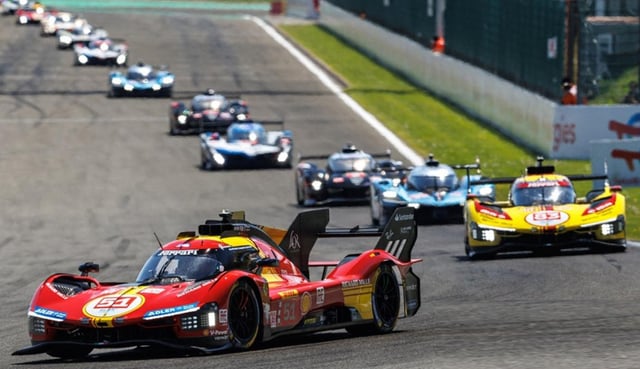 Amazing shot of a dozen Hypercars gracefully racing in line at Spa