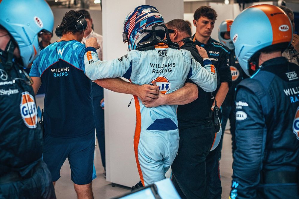 Logan Sargeant being helped through the paddock during the 2023 Qatar Grand Prix