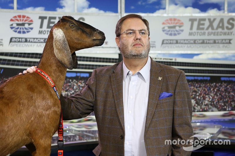 Texas Motor Speedway president Eddie Gossage with Lil Dale, a stuffed goat