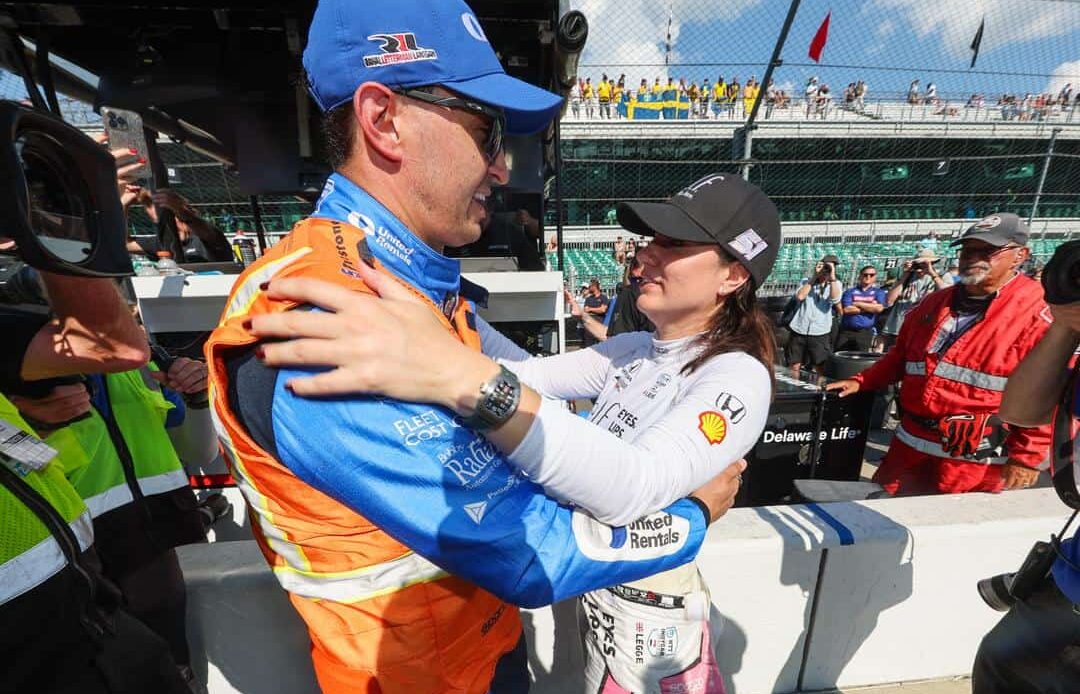 Graham Rahal And Katherine Legge embrace following the Last Chance Qualifying session for the 2024 Indianapolis 500.