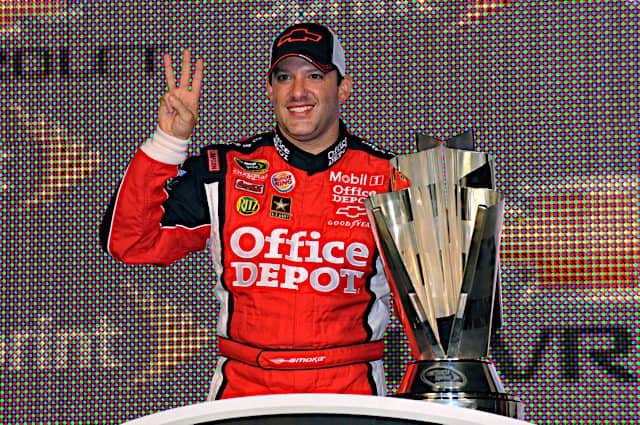 Tony Stewart celebrates his third NASCAR Cup Series championship, November 2011.