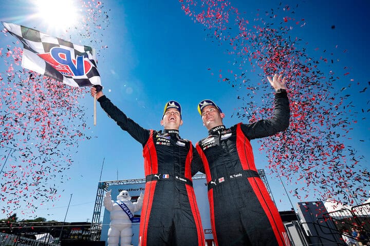Mathieu Jaminet and Nick Tandy celebrate their victory in the Motul Course de Monterey at WeatherTech Raceway Laguna Seca, 5/12/2024 (Photo: Courtesy of IMSA)