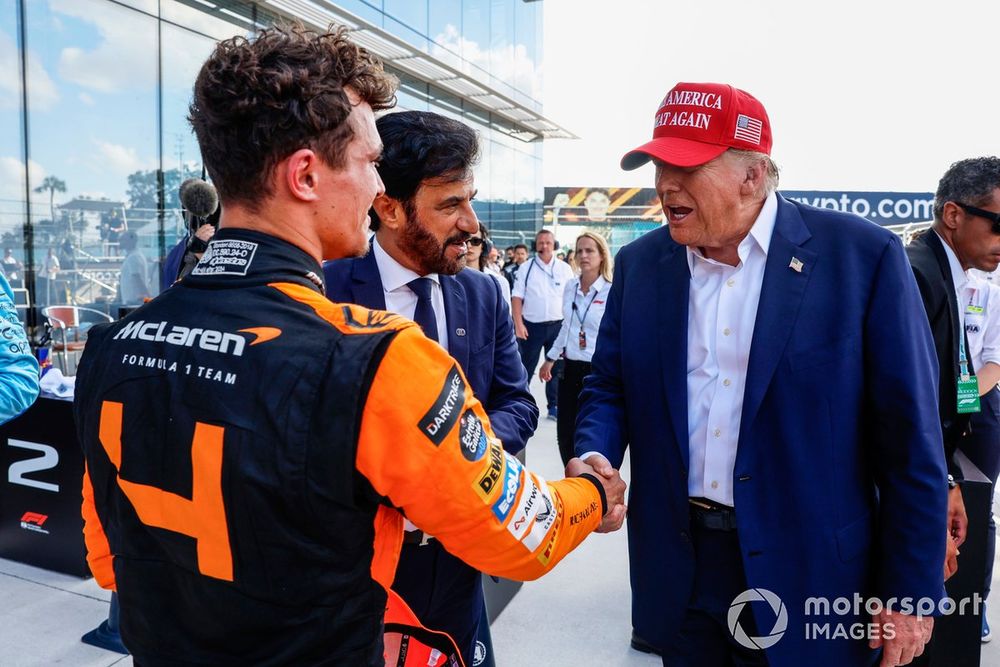 Lando Norris, McLaren F1 Team, 1st position, is congratulated by Donald Trump
