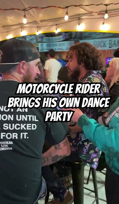 Motorcycle Rider Brings His Own Dance Party!
