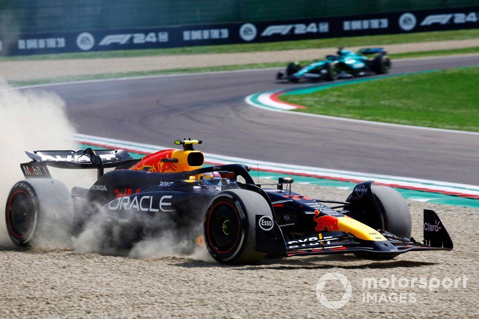 Sergio Perez, Red Bull Racing RB20, drives off the track into the gravel