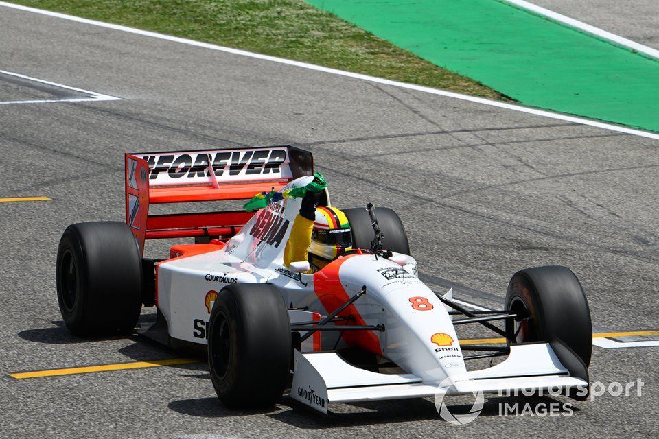 Sebastian Vettel drives Ayrton Senna's McLaren MP4/8