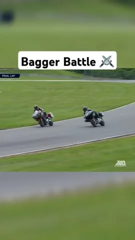 Harley-Davidson rider Kyle Wyman, Indian Motorcycle rider Troy Herfoss race in a close finish