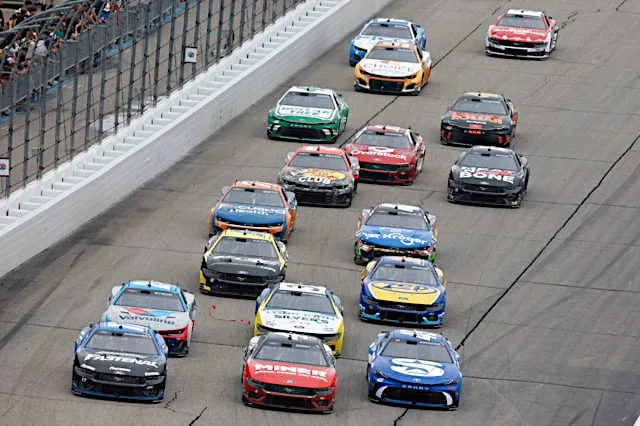 2024 Cup New Hampshire pack racing IV - Chris Buescher, No. 17 RFK Racing Ford, Josh Berry, No. 4 Stewart-Haas Racing Ford, and Tyler Reddick, No. 45 23XI Racing Toyota (Credit: NKP)