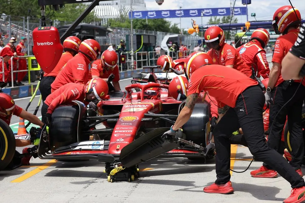 The Scuderia Ferrari pit crew do a pit stop on Charles Leclerc, Ferrari SF-24