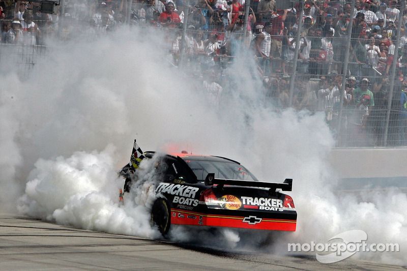 Race winner Martin Truex Jr. does a burnout