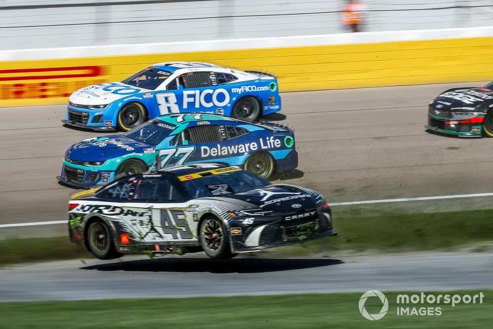 Tyler Reddick's car lifts up off the ground