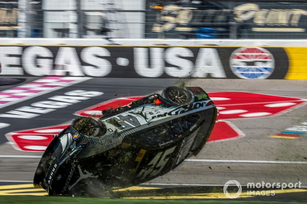 Tyler Reddick, 23XI Racing, Jordan Brand Toyota Camry flips in the infield grass