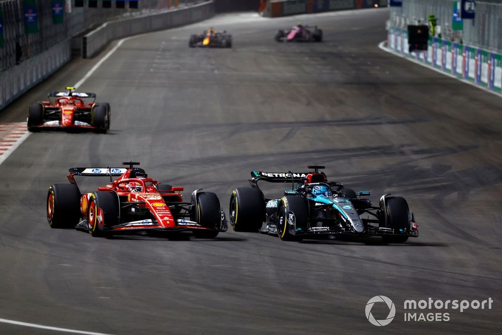 Charles Leclerc, Ferrari SF-24 battles with George Russell, Mercedes F1 W15 